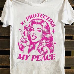 White T-Shirt with Pink Graphic